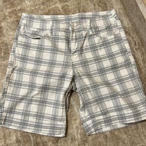 NWOT- Bermuda shorts size 6. Gray & white striped pattern. Excellent condition.